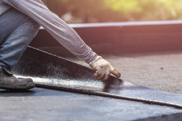 Professional Waterproofing technician working in Newport, IN